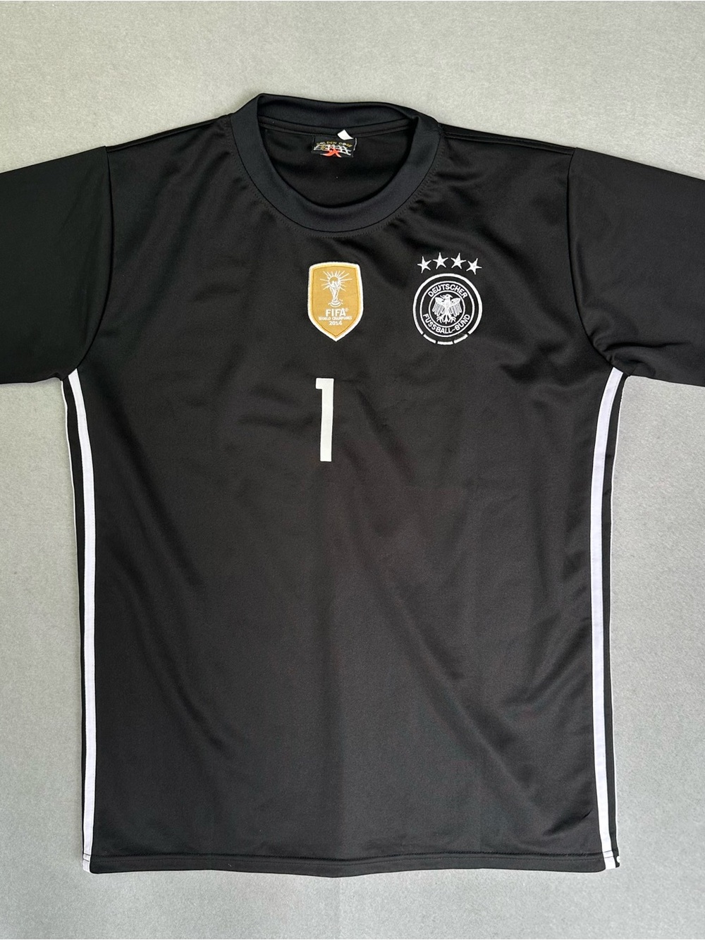Black Men’s Short-Sleeve Soccer Jersey with White Accents